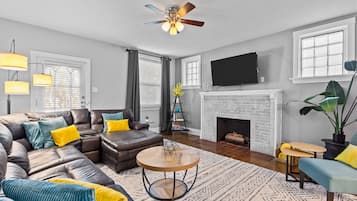 Apartment, Multiple Beds, Fireplace, City View | Living area | 40-inch TV with cable channels, fireplace