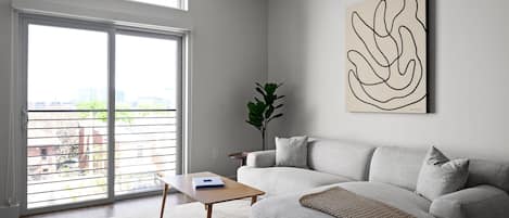 Condo, Multiple Beds, Kitchen, City View (Unit 301) | Living area | 40-cm TV with digital channels