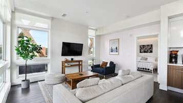 Condo, Multiple Beds, Balcony, Mountain View (unit 304) | Living area | 40-cm TV with digital channels