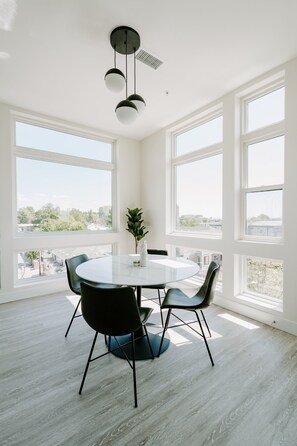 Condo, 1 King Bed, Kitchen (Unit 410) | 2 bedrooms, individually decorated, individually furnished, bed sheets