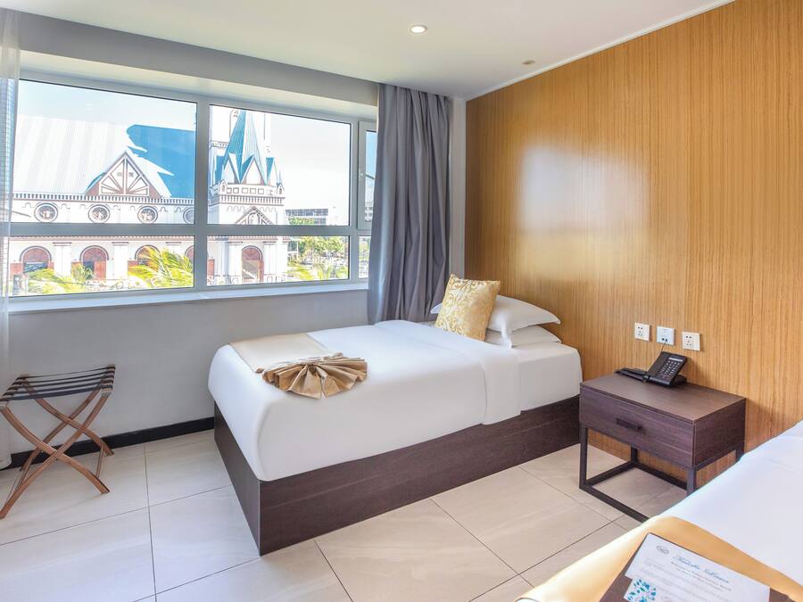 Premium bedding, down duvets, desk, laptop workspace