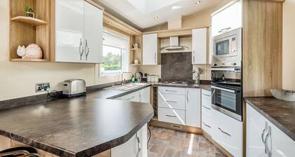 Country and modern cladded lodge.