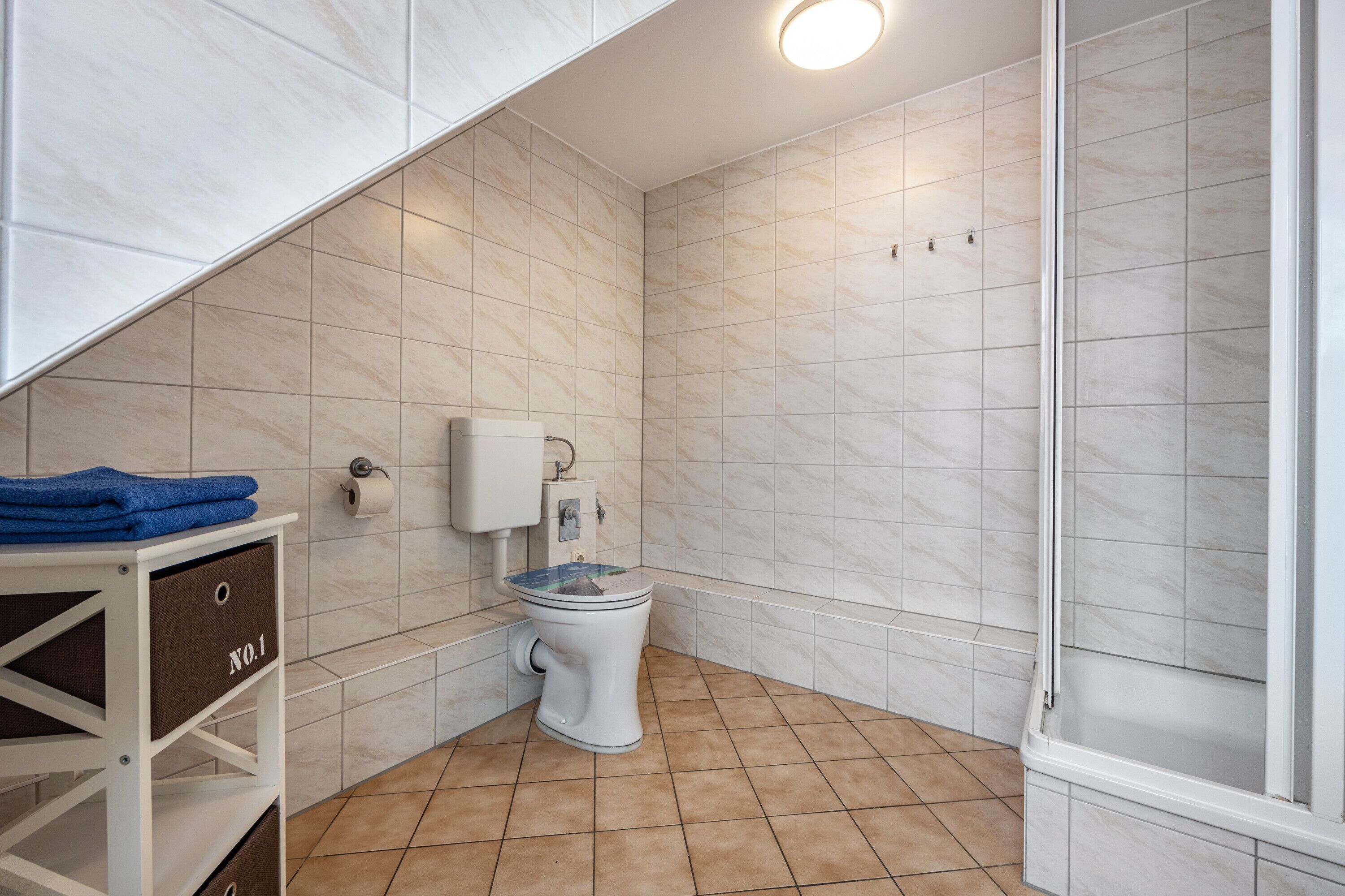 Een douche, handdoeken