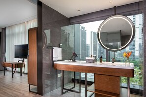 Executive Room, 1 Queen Bed | Bathroom | Shower, hair dryer, slippers, towels