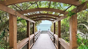A wooden boardwalk leading to a gazebo with a view of the ocean. - One Seagrove Place 1503 (Santa Rosa Beach)
