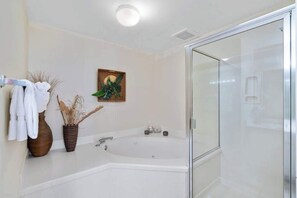 Shower, hair dryer, towels, shampoo