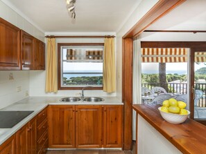 Fridge, highchair, cookware/dishes/utensils - "Melis II M6-Playa de Pals" by Interhome (Pals)