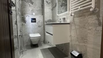Hair dryer, towels, soap, toilet paper