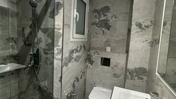 Hair dryer, towels, soap, toilet paper