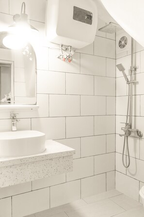 Studio | Bathroom | Designer toiletries, hair dryer, bathrobes, towels