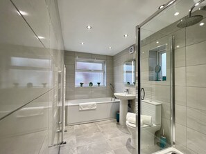 Shower, eco-friendly toiletries, hair dryer