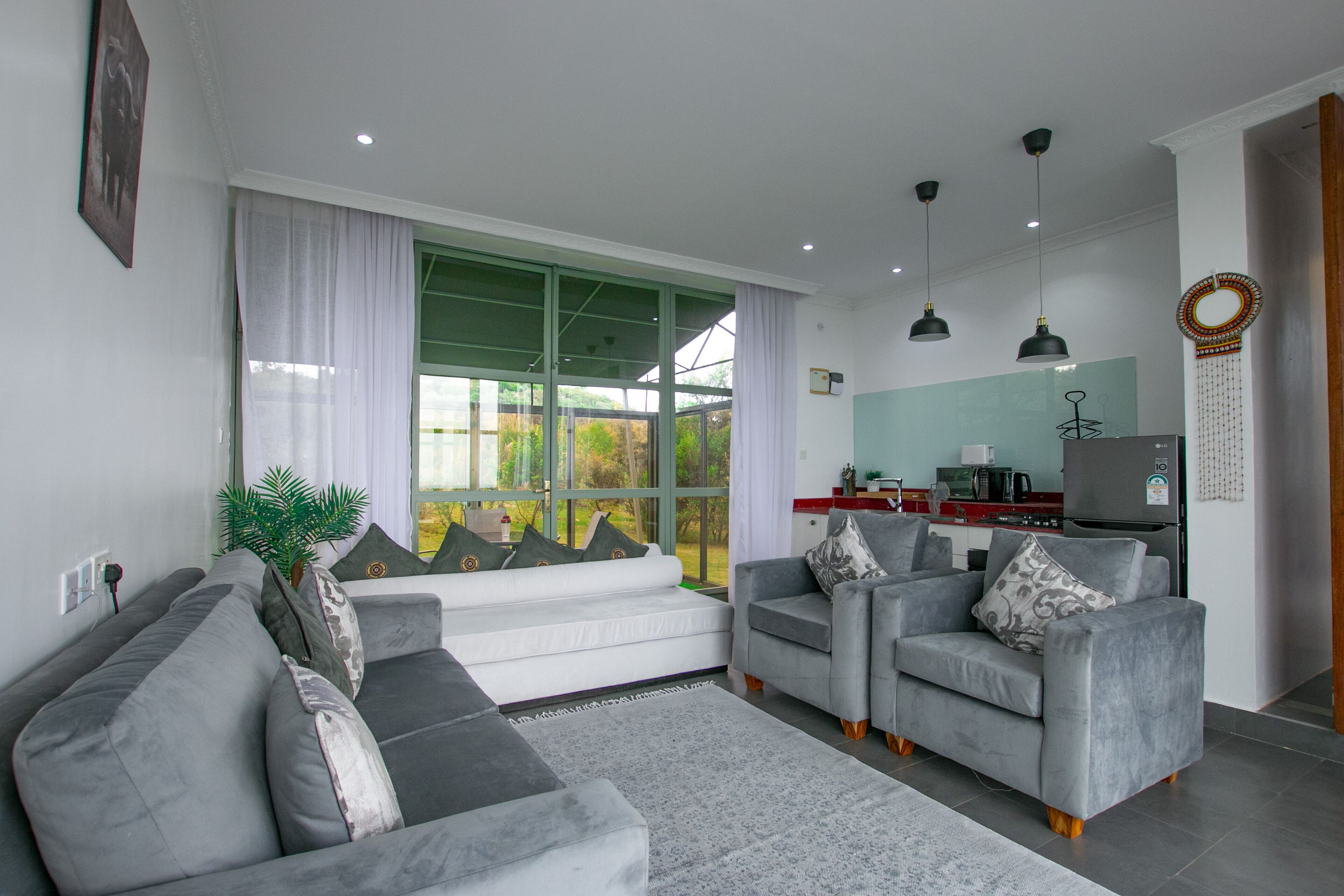 Exclusive Bungalow, 1 Bedroom | Living area | 45-inch flat-screen TV with digital channels