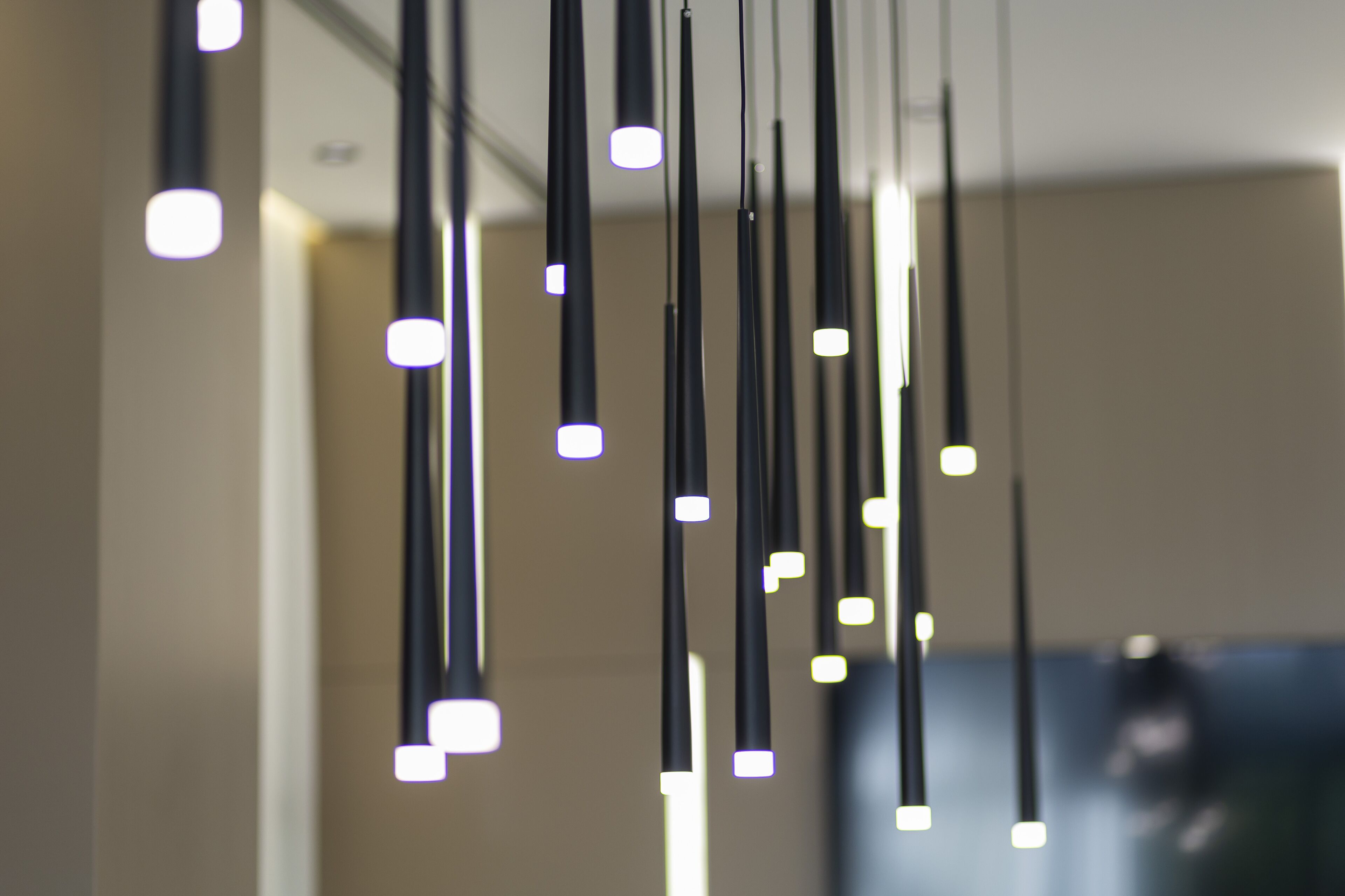 A modern interior with hanging pendant lights.