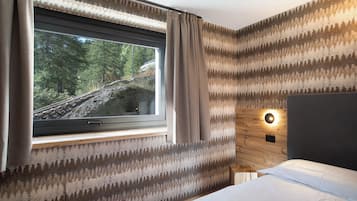 2 slaapkamers, een strijkplank/strijkijzer, gratis wifi, beddengoed
