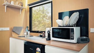 Fridge, microwave, stovetop, coffee/tea maker