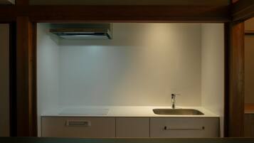 Fridge, microwave, cookware/dishes/utensils