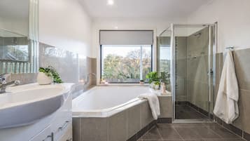 Bathtub, hair dryer, towels