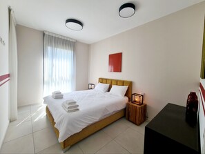 Apartamento, 2 quartos, sacada | 2 quartos, escrivaninha, berços (sobretaxa), Wi-Fi de cortesia