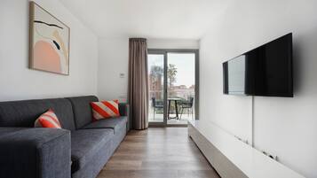 Apartment, 1 Schlafzimmer, Balkon (Sofa) | Zimmersafe, laptopgeeigneter Arbeitsplatz, kostenloses WLAN, Bettwäsche