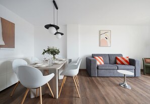L 2 Bedroom Apartment, Balcony & Sofa | Living area | 43-inch Smart TV with digital channels