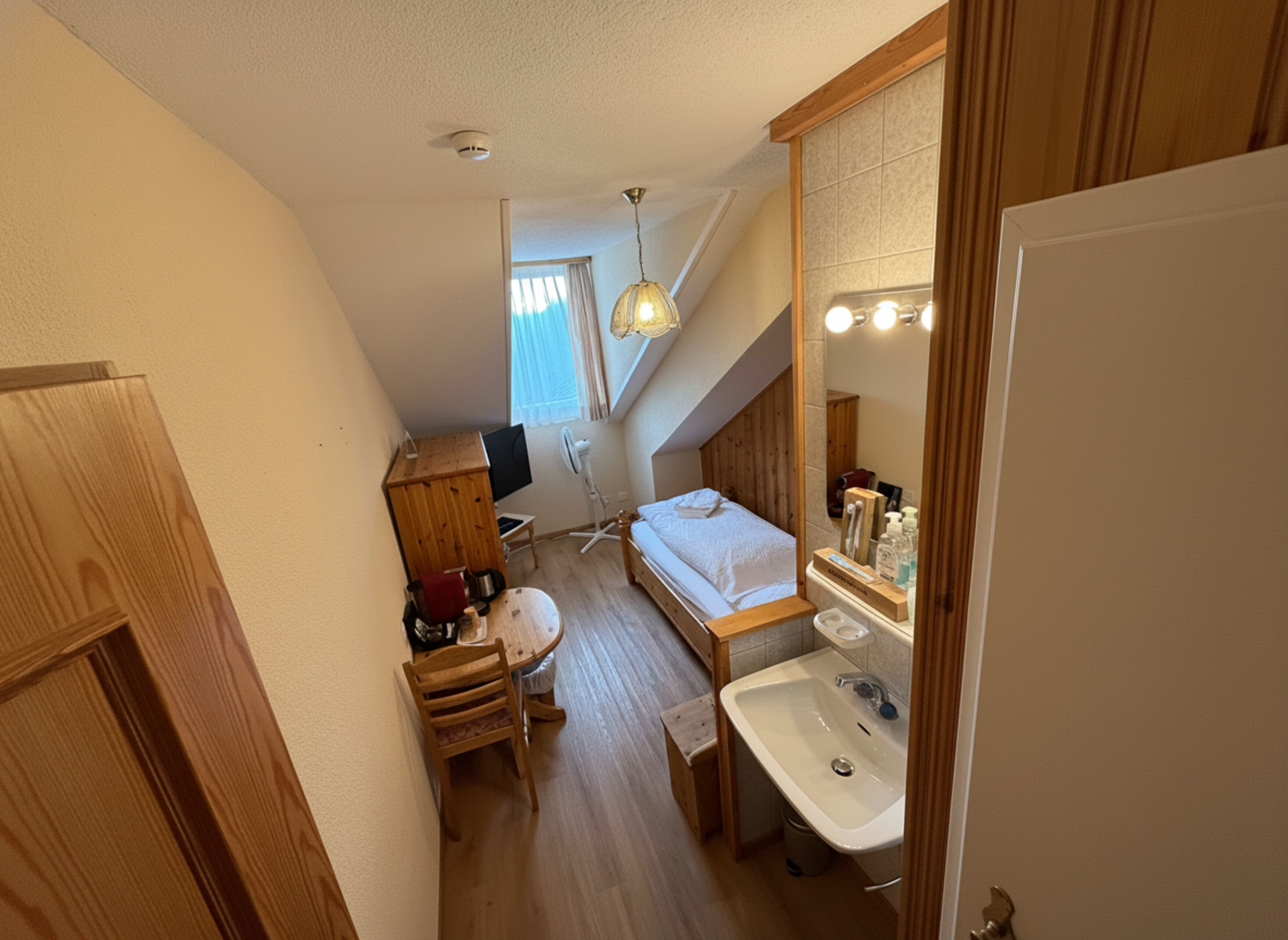 Basic Single Room | Premium bedding, memory-foam beds, desk, soundproofing