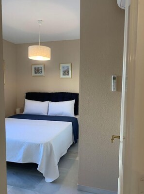 2 dormitorios, tabla de planchar con plancha, wifi gratis y ropa de cama