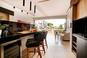 Kitchen amenities include a full-size refrigerator, stove, oven and dishwasher - Soho PV: Luxury, Art, and Breathtaking Views (Puerto Vallarta)