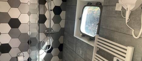 Shower, hair dryer, towels, soap