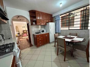 Fridge, microwave, dishwasher, coffee/tea maker