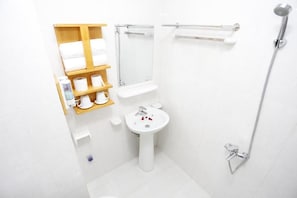 Rainfall showerhead, designer toiletries, hair dryer, slippers