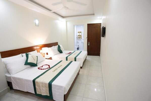 Pillowtop beds, desk, blackout drapes, free WiFi