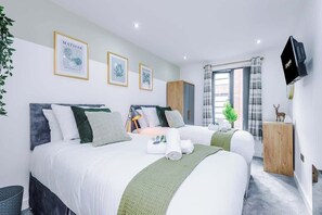 2 dormitorios, tabla de planchar con plancha, wifi y ropa de cama