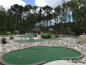 Property grounds - Sunny coastal home with private patio, on-site pool, central AC, & W/D (Berlin)