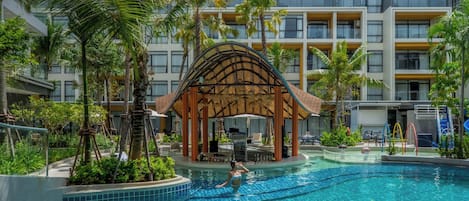 Outdoor pool, pool umbrellas, sun loungers