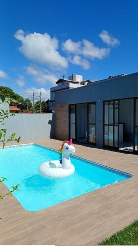 Aconchegante Casa de Madeira com Linda Área Lazer!