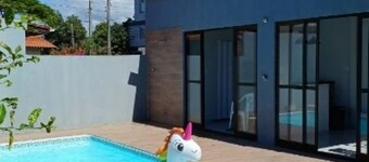 Aconchegante Casa de Madeira com Linda Área Lazer!