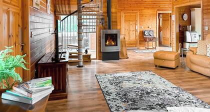 A superb family lodge with a private hot tub, sauna and games zone.