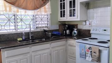 Fridge, microwave, dining tables