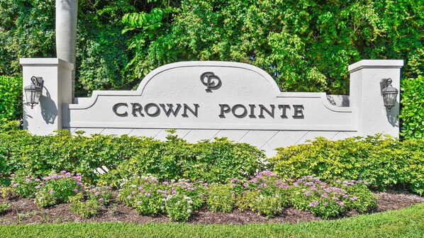 A sign with the words 'CROWN POINT' indicating a location. - Altaira - Top Location, Lake View, Pool, Spa,4 Bed (Naples)