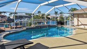 Outdoor pool, a heated pool - Lupita, boat lift, dock, heated south facing pool (Cape Coral)