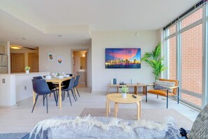 50-inch Smart TV with cable channels - DC Getaway Comfort Apartments (Arlington)