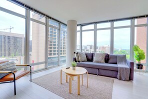 50-inch Smart TV with cable channels - DC Getaway Comfort Apartments (Arlington)