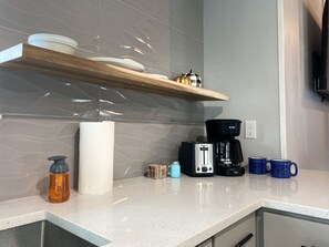 Standard Apartment | Private kitchen | Fridge, microwave, coffee/tea maker, cookware/dishes/utensils - The Contemporary (Sanford)