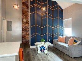 Standard Apartment | Living area | 50-inch LCD TV with digital channels, Netflix, streaming services