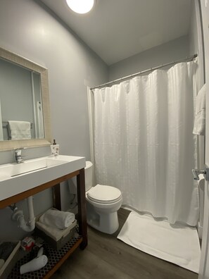 Standard Apartment | Bathroom | Shower, hair dryer, towels - The Contemporary (Sanford)