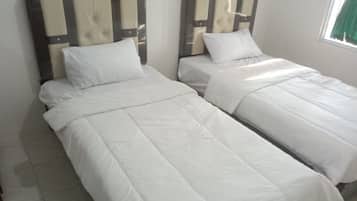 Kahden hengen economy-huone | Vuodevaatteet