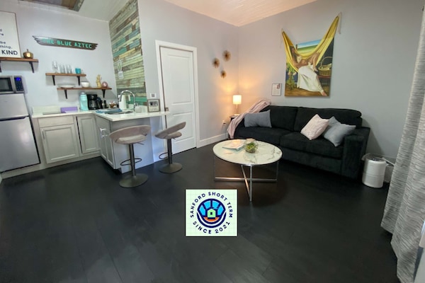 Standard Apartment | Living area | 50-inch LCD TV with digital channels, Netflix, streaming services