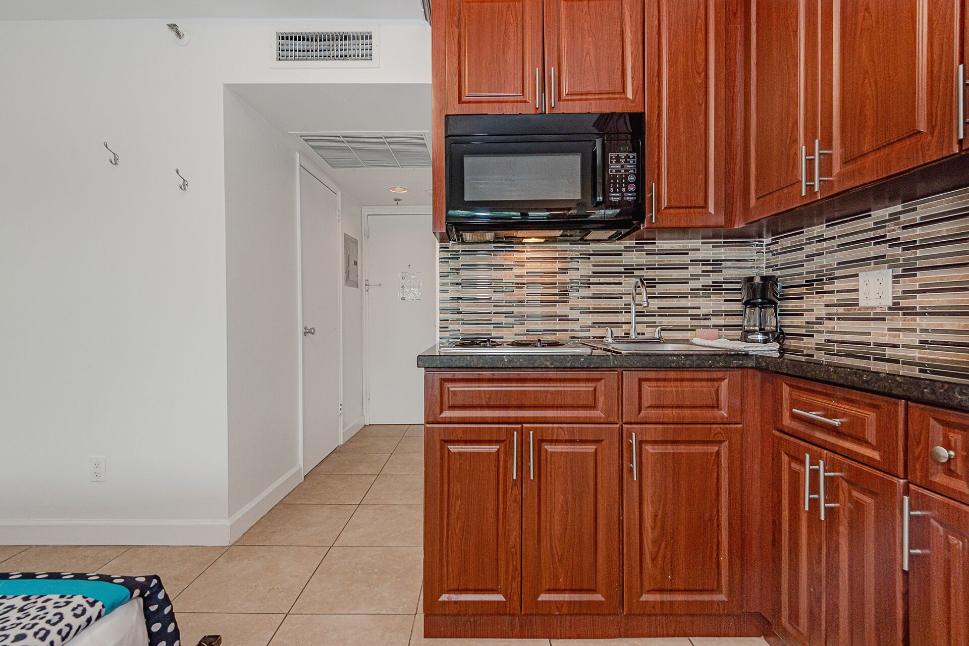 Fridge, microwave, cookware/dishes/utensils