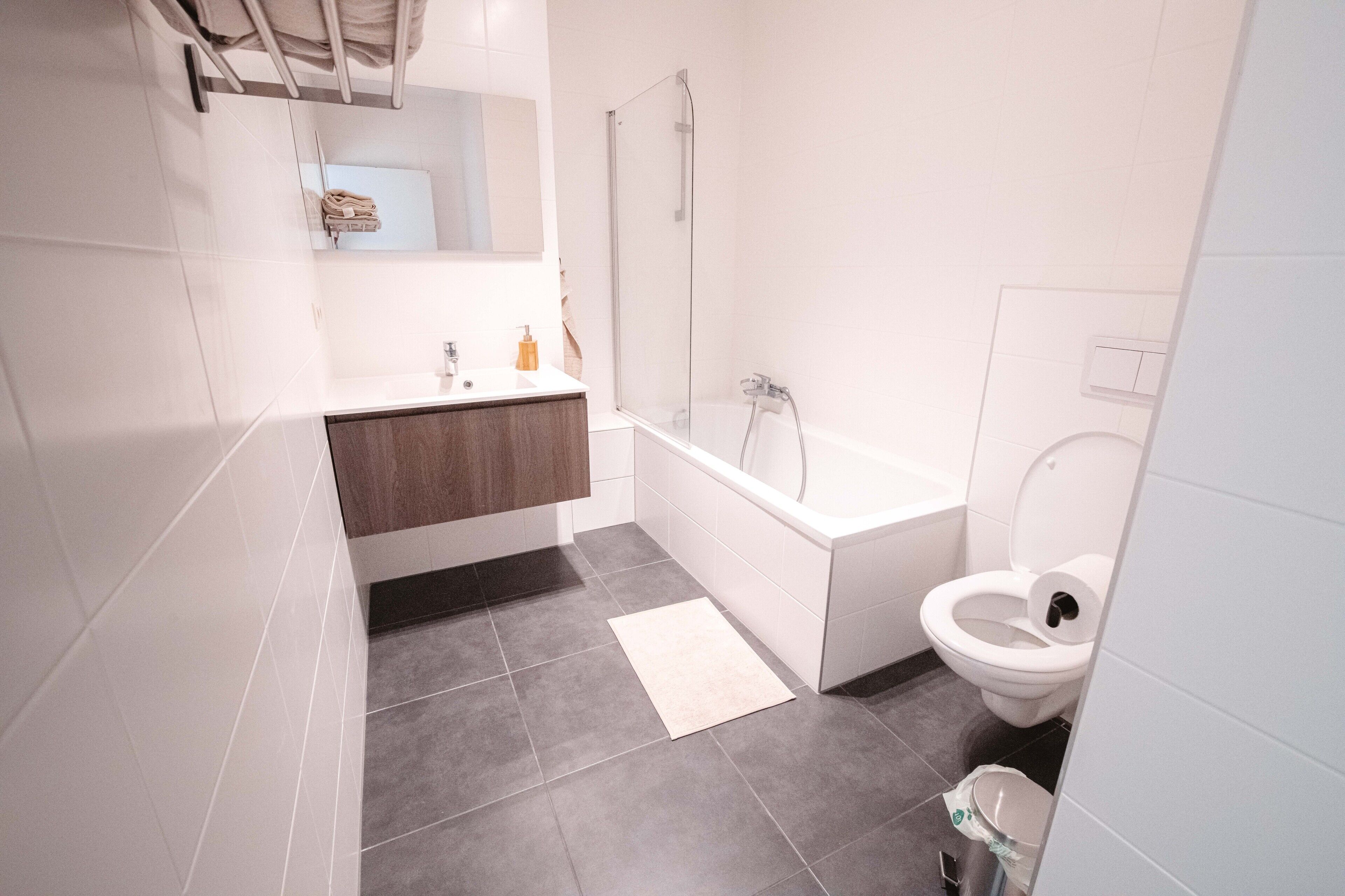 design duplex | bathroom | hair dryer, heated floors, towels, soap