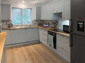 Dishwasher, high chair, cookware/dishes/utensils